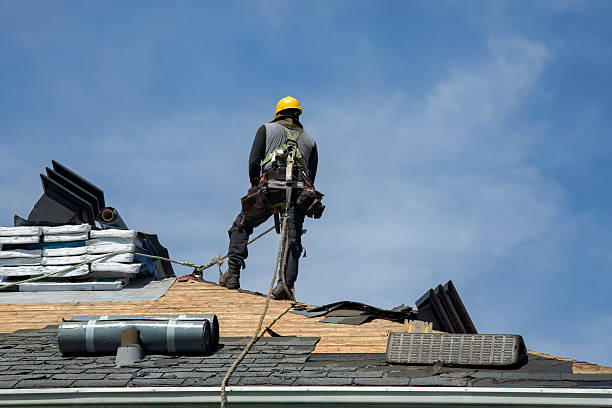 Professional Gutter Installation technician working in Remsenburg, NY